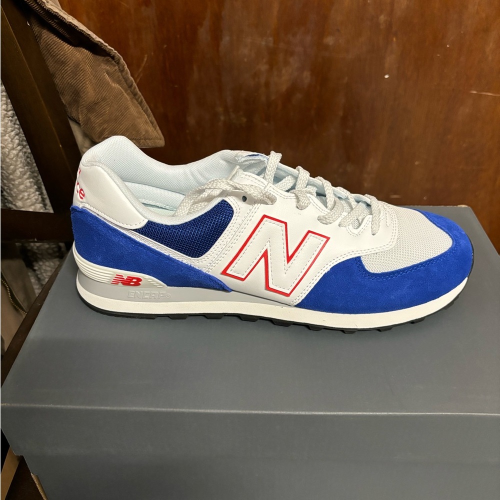 New Balance Classic sneakers. Size 12M. Blue with red accents. NWT.